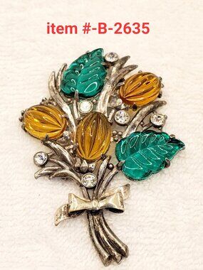 1 Brooch, item # B-2365,.  wt. 33 grams.